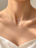 Silver double-layer star pendant necklace for women worn on model | SKREAM
