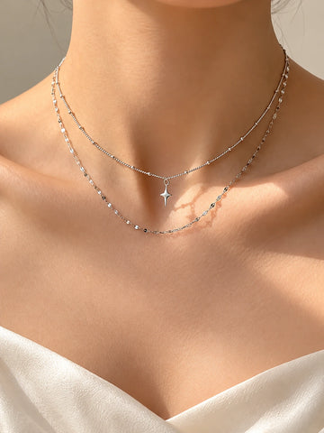 Silver double-layer star pendant necklace for women worn on model | SKREAM